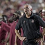 Mike Norvell watches FSU in action.