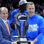 Duke head coach Jon Scheyer celebrates the ACC Tournament.