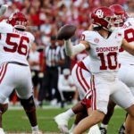 John Mateer throws a pass vs. Alabama.